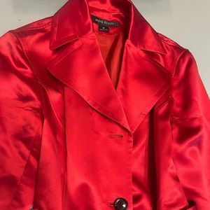 This is a used Anne Klein red satin trench coat!